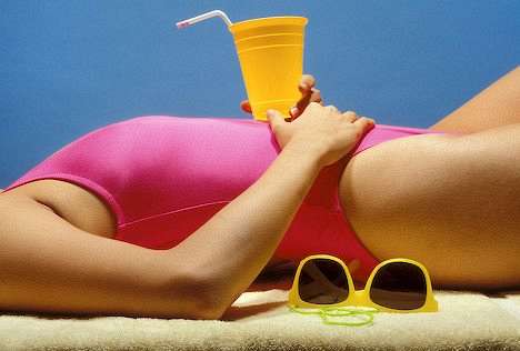 Woman relaxing on towel