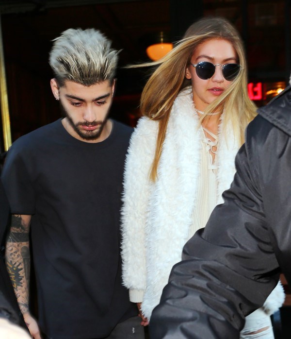 Gigi Hadid and Zayn Malik hold hands when coming out of their hotel in NYC Pictured: Gigi Hadid, Zayn Malik Ref: SPL1203658  060116   Picture by: XactpiX/Splash News Splash News and Pictures Los Angeles:	310-821-2666 New York:	212-619-2666 London:	870-934-2666 photodesk@splashnews.com 