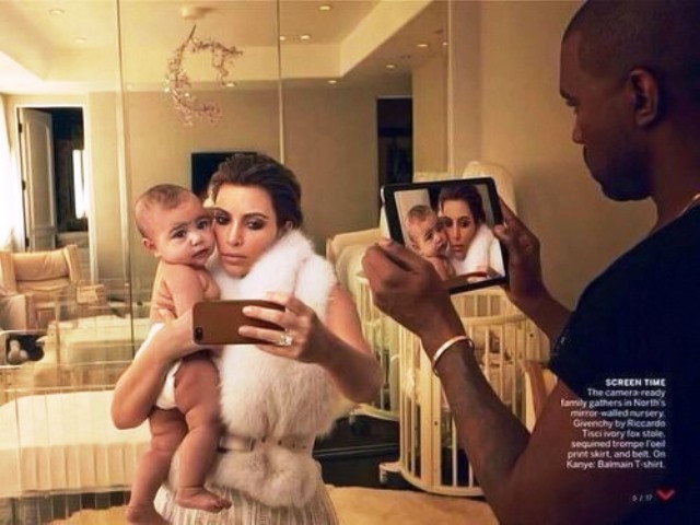 Kanye-West-and-Kim-Kardashian-posing-for-Vogue-spread-with-North-West-April-2014
