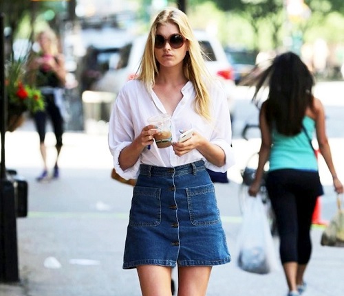 Le-Fashion-Blog-Model-Off-Duty-Street-Style-Elsa-Hosk-70s-Inspired-Button-Front-Denim-Skirt-Oversized-Round-Sunglasses-White-Shirt-Braid-Sandals
